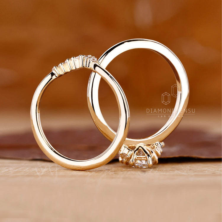 Seven stone wedding band in yellow gold.
