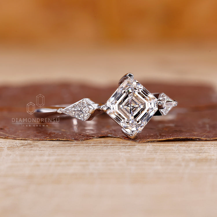 Tapered Shank Three Stone Asscher Cut Diamond Ring