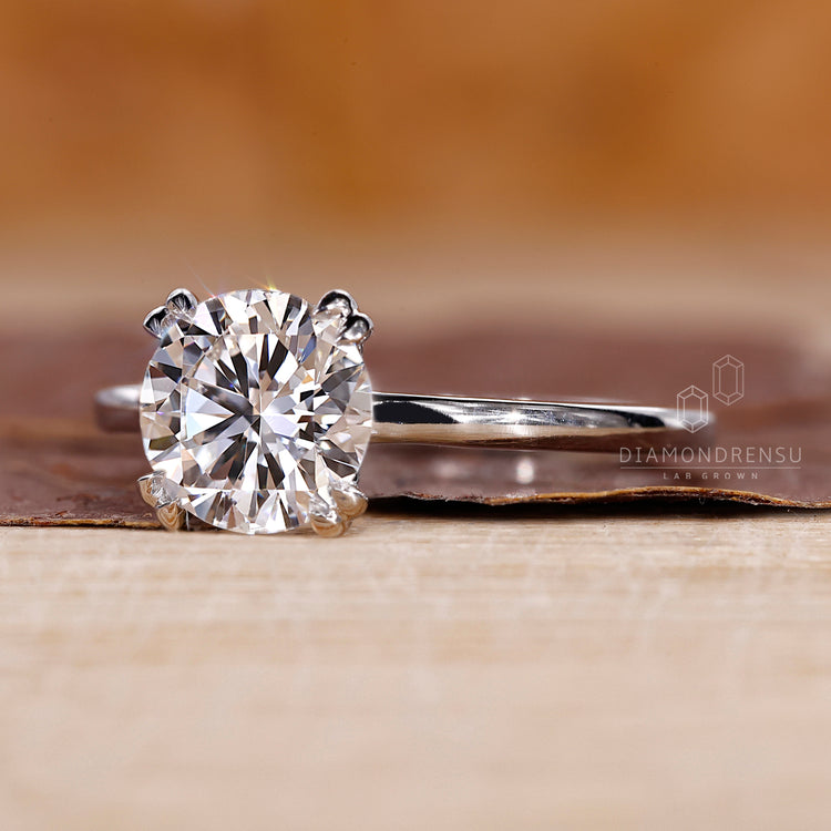 Tulip ring with solitaire engagement ring style.
