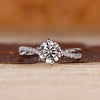 White gold diamond engagement ring with refined elegance.
