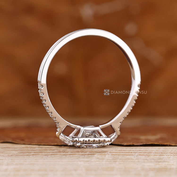 Handmade princess diamond ring with round halo stones.