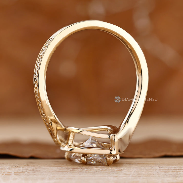 Pavé engagement ring with six claw prong setting.