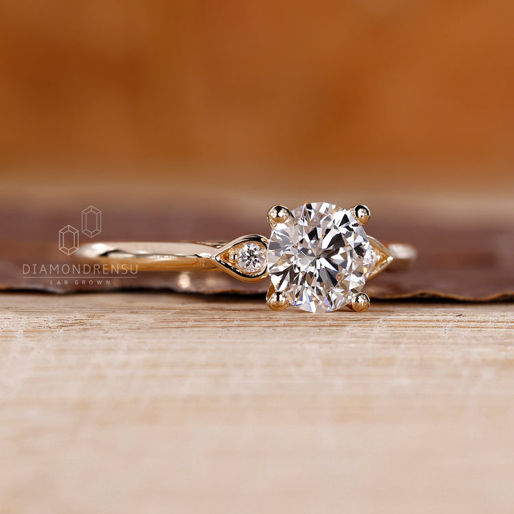 IGI certified round diamond ring with four prong setting.