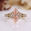 Art Deco engagement ring with pink marquise cut diamond.