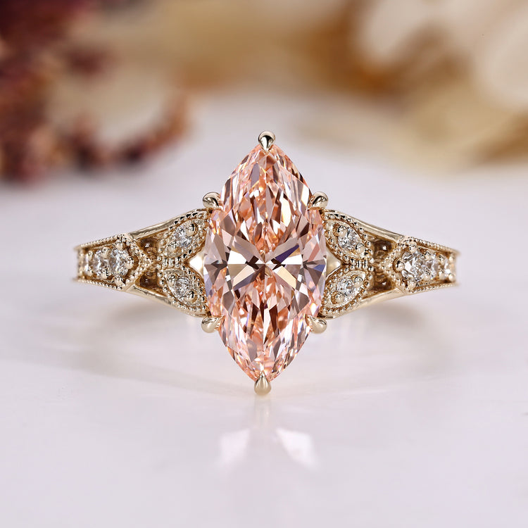 Art Deco engagement ring with pink marquise cut diamond.