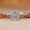 Twisted shank engagement ring with Portuguese cut diamond.