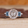 Portuguese cut lab grown diamond ring with sapphire sides.