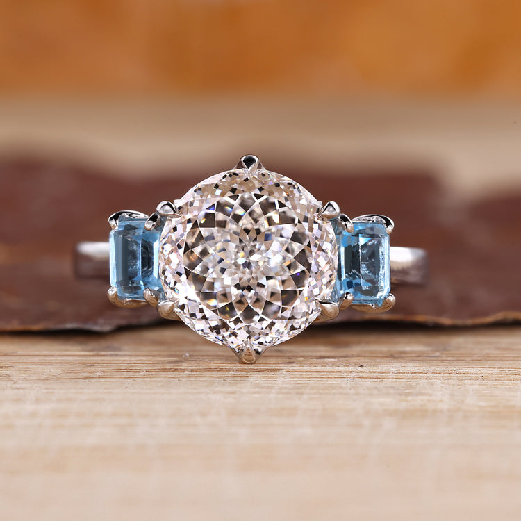 Portuguese cut lab grown diamond ring with sapphire sides.