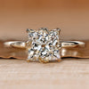 Princess cut diamond ring with tulip setting.