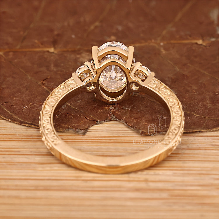 IGI certified oval diamond ring with filigree band.
