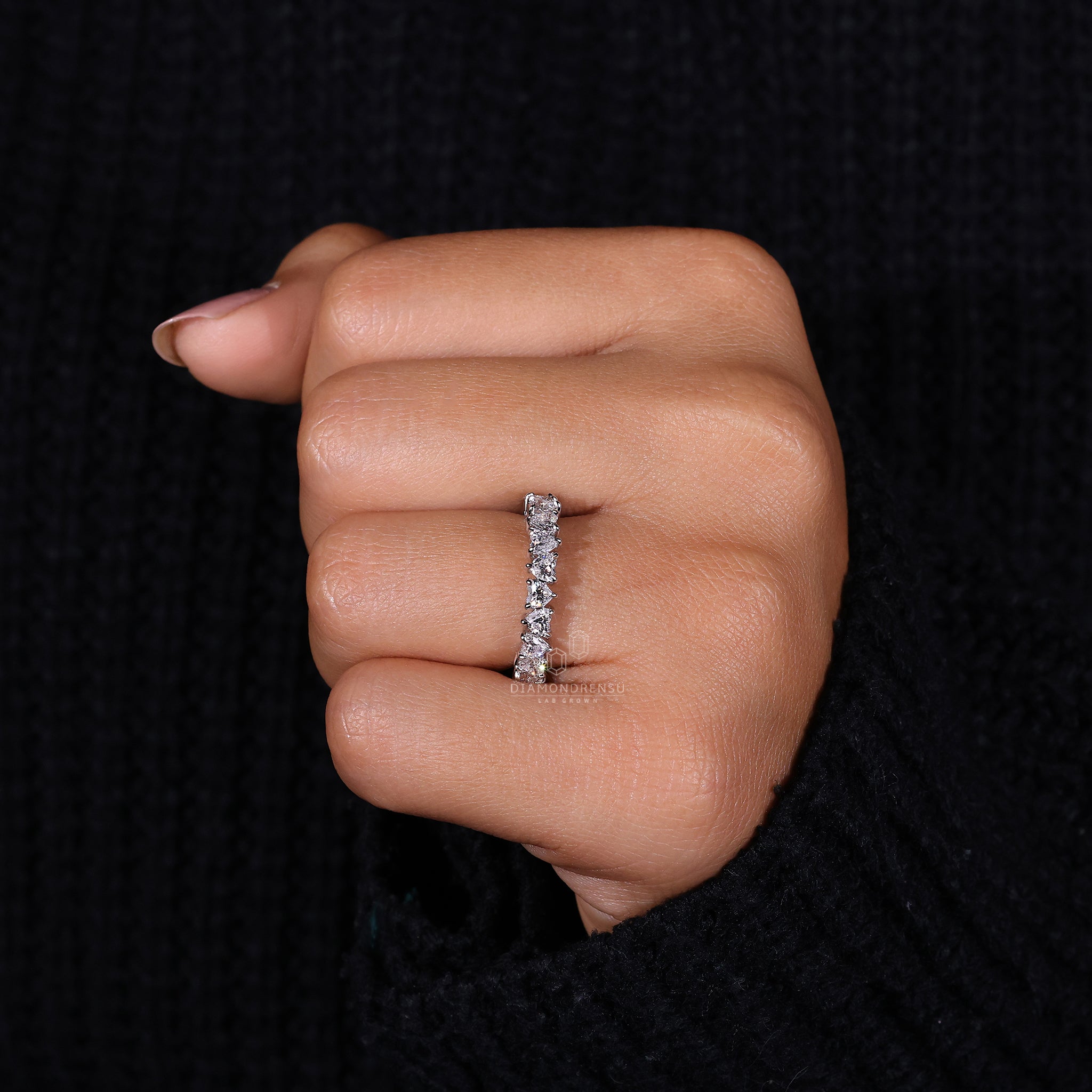 Elegant half eternity heart diamond ring.
