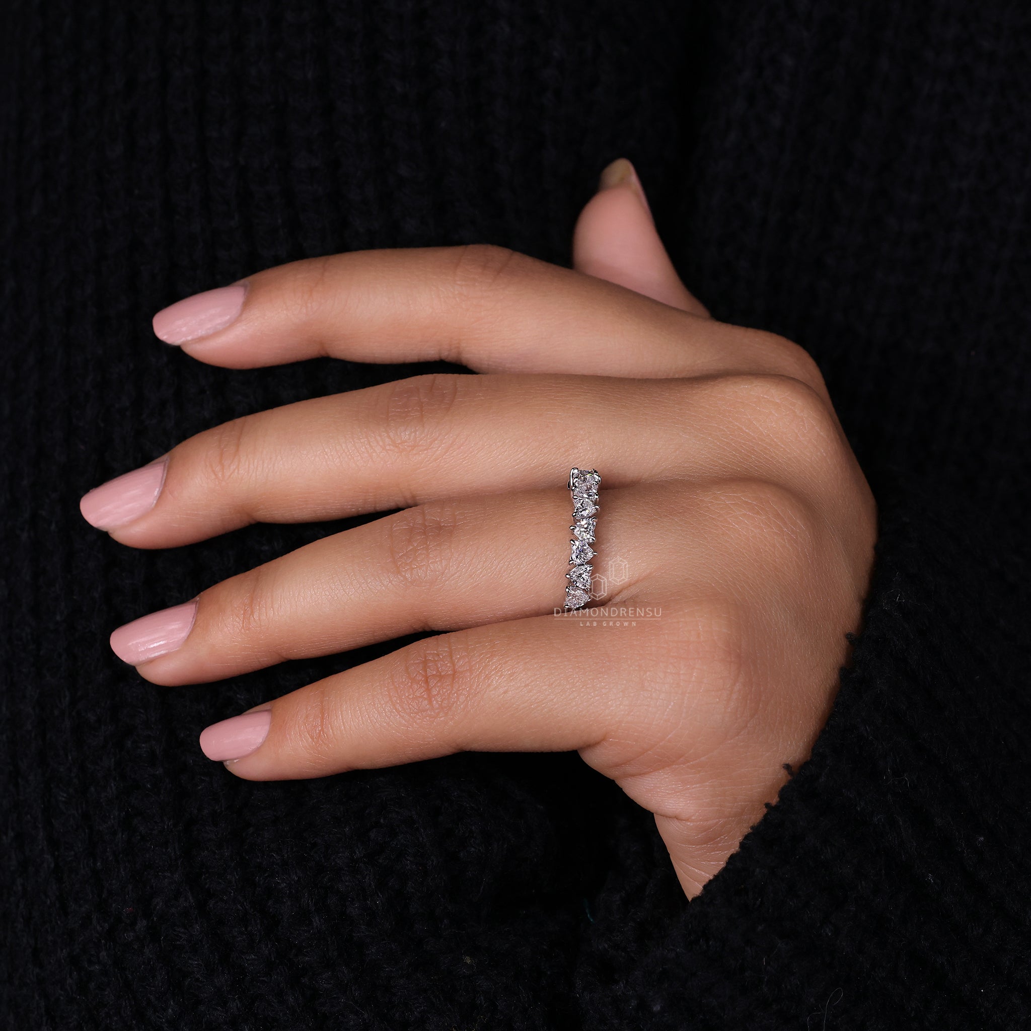 White gold lab grown heart diamond band.
