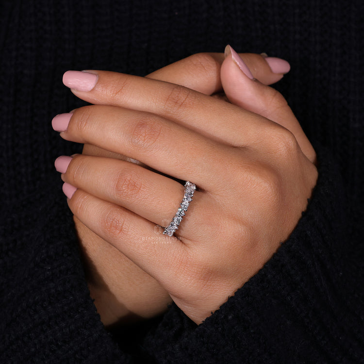 Half eternity wedding band with heart diamonds.
