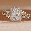 Radiant cut engagement ring with round diamond halo.