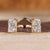 Radiant cut lab grown diamond two stone engagement ring.