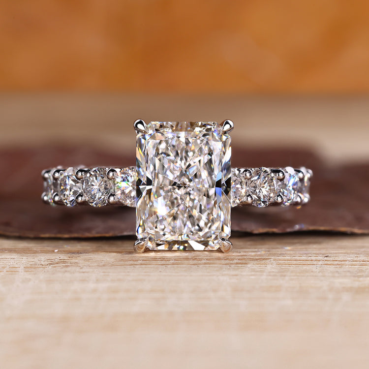 Radiant cut lab grown diamond ring with micro pave band.