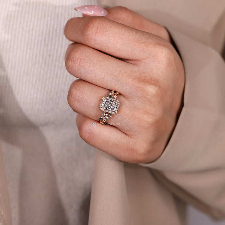 Lab grown diamond engagement ring with four claw prongs.
