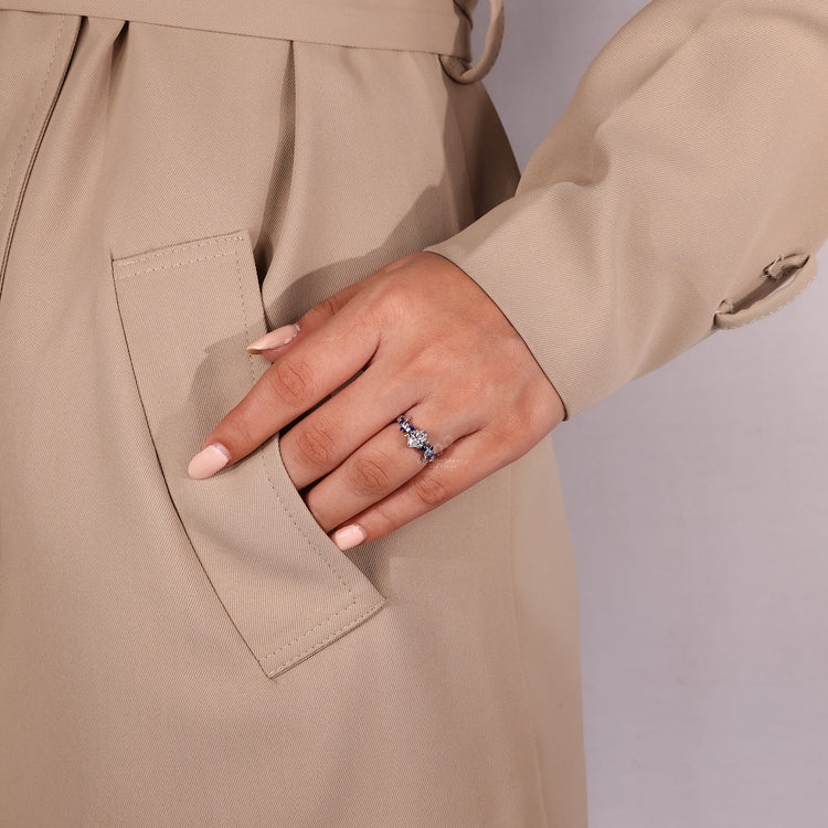 IGI certified marquise diamond ring with tanzanite gemstones.