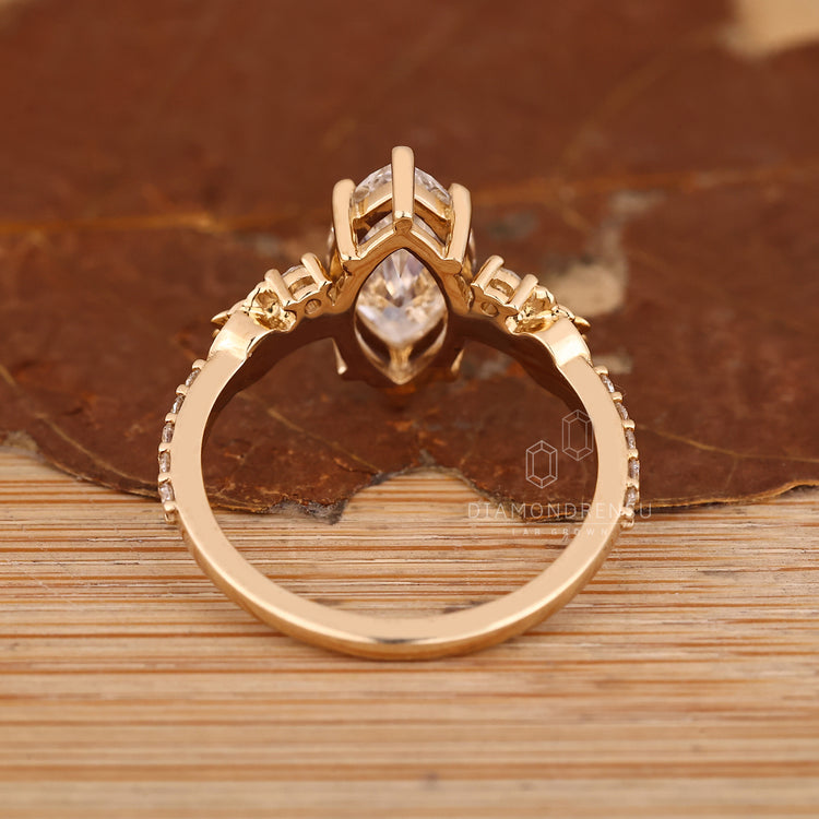 Lab grown marquise diamond ring with flower design.