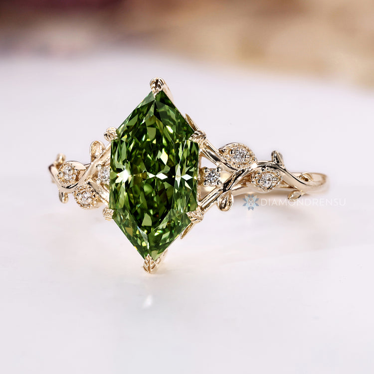Dutch marquise ring with round diamond side stones.
