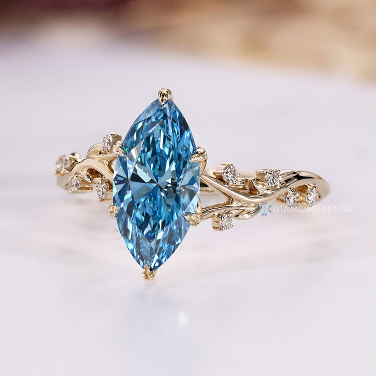 Lab grown marquise diamond ring with hidden blue sapphire