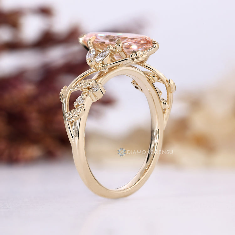 Marquise engagement ring with nature inspired setting style.