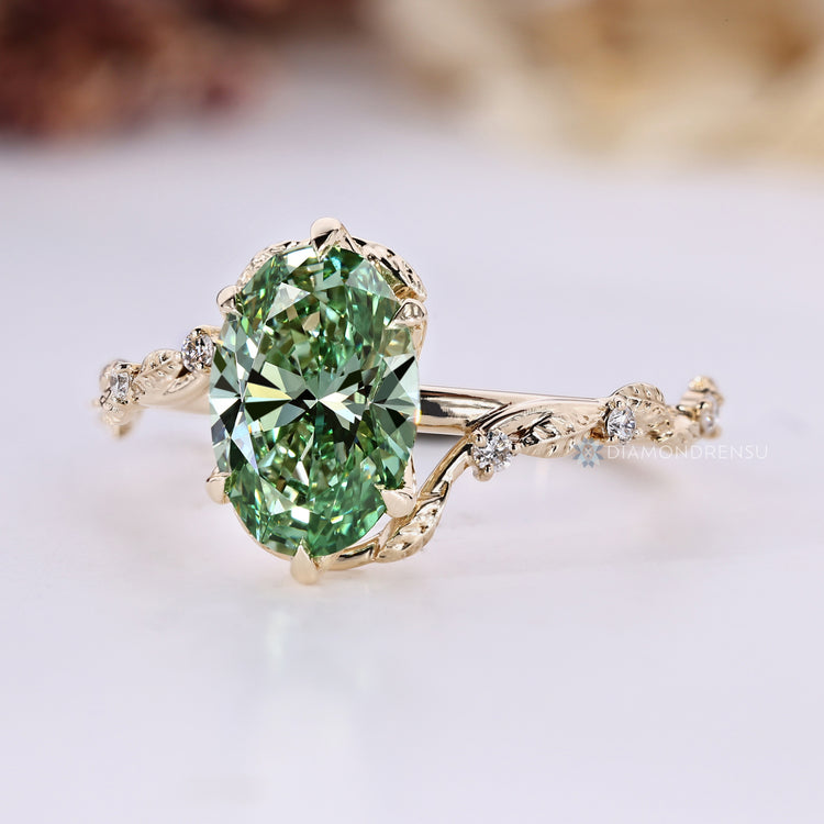 Lab grown diamond ring with round side stones.