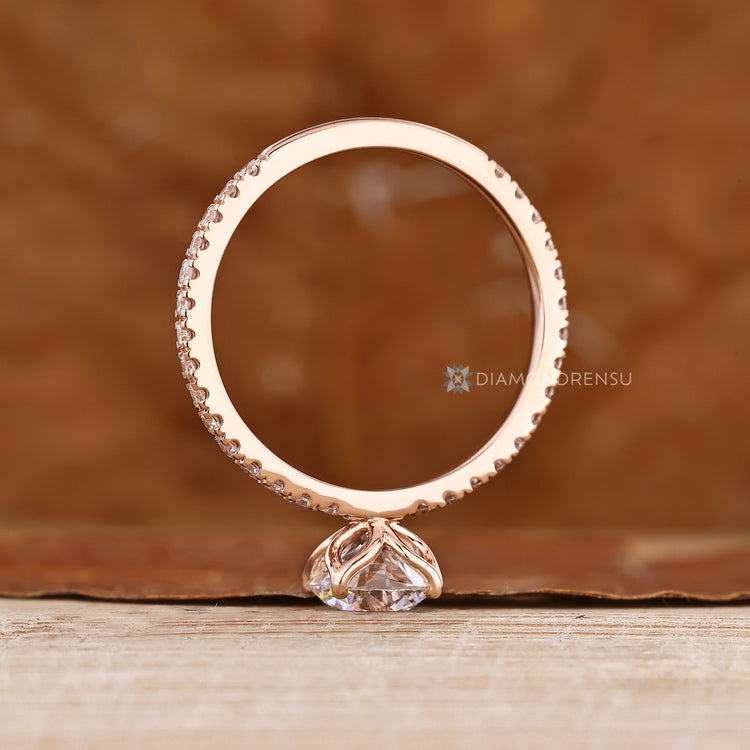 Pavé style engagement ring with round lab grown diamond.