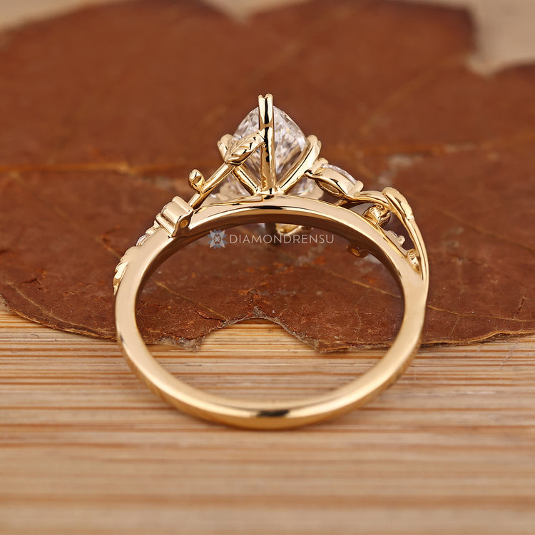 Handmade lab grown diamond ring with filigree details.