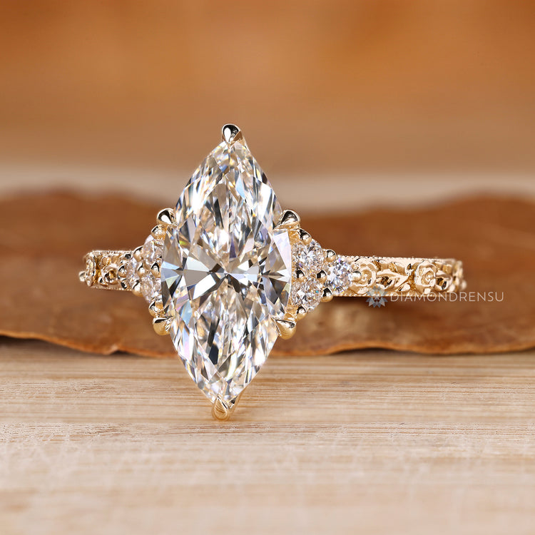 IGI certified marquise engagement ring with tulip setting.