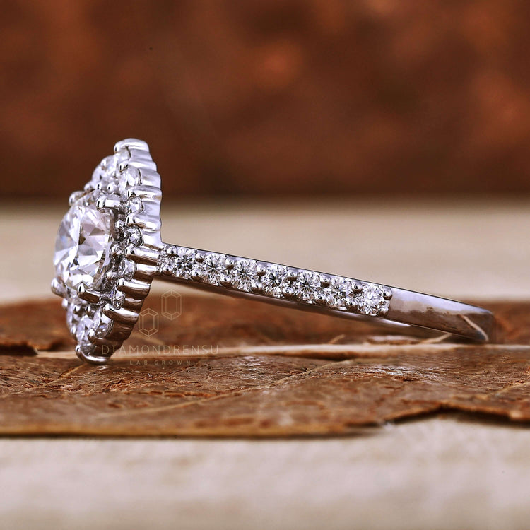 Diamond a ring with 4 prong diamond ring setting and a modern minimalist style.
