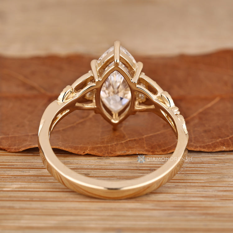 Handmade marquise diamond ring with muse setting.