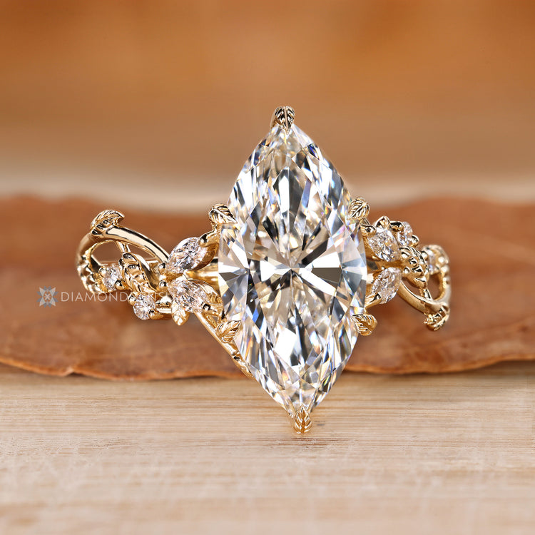 Lab grown diamond ring with six leaf prong setting.