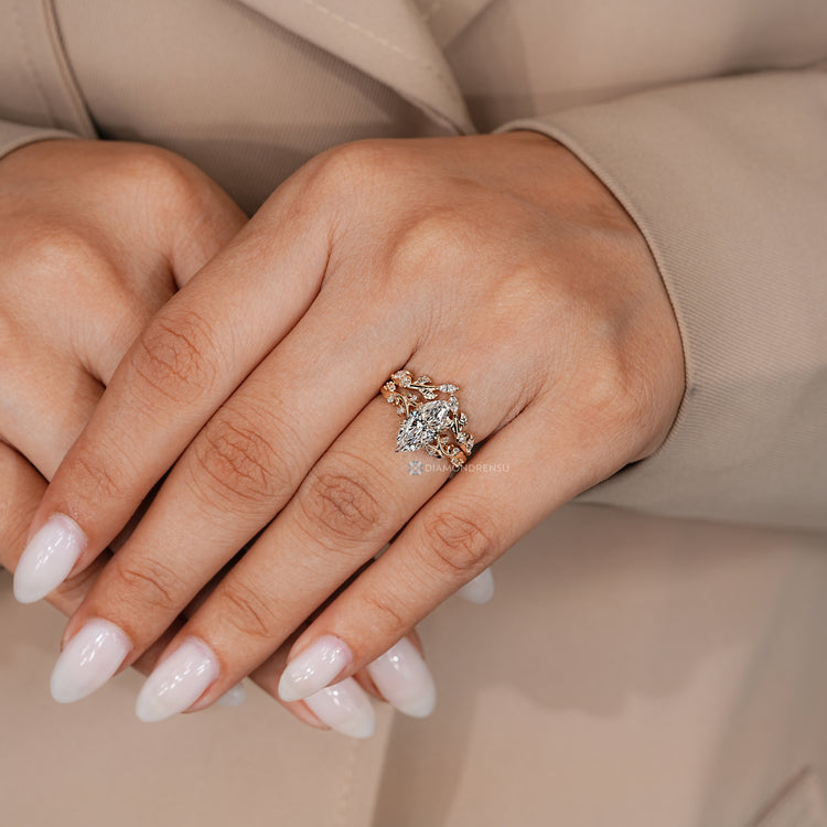 Handmade marquise ring with six leaf style prong setting.