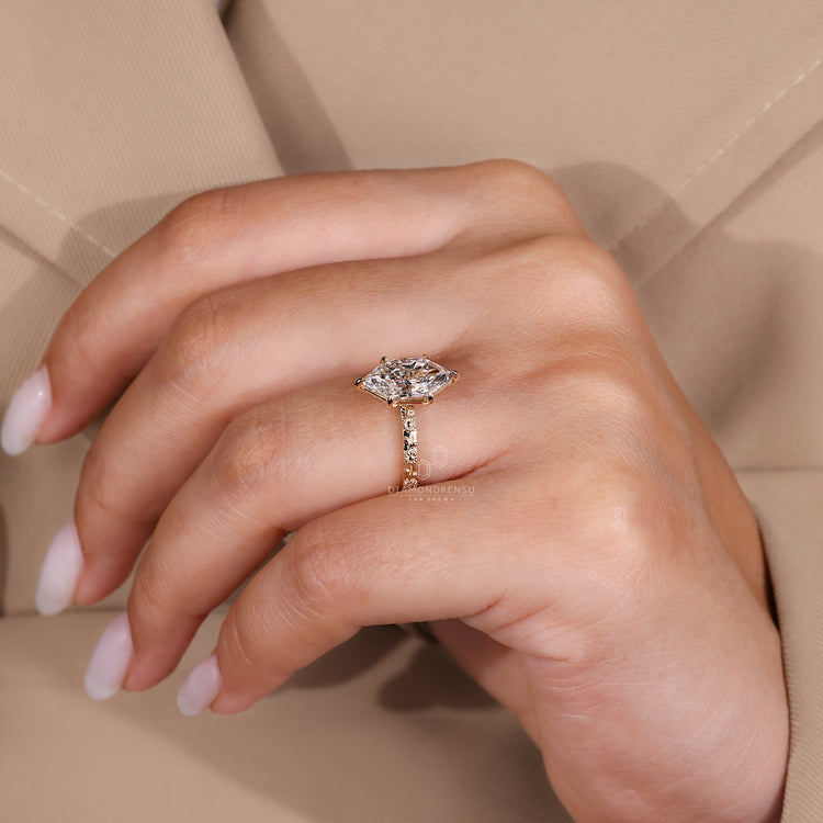Lab grown dutch marquise ring with six claw prong.