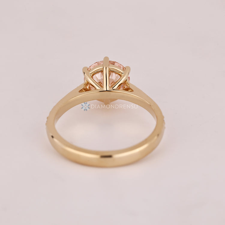 Handmade lab grown diamond ring with round diamonds.