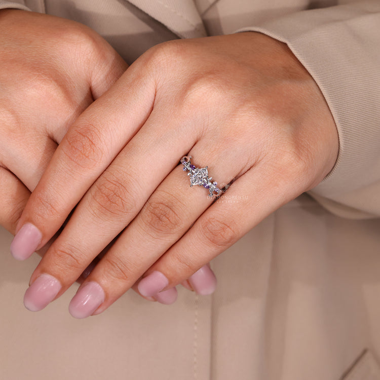 Handmade ring with leaf prong and marquise diamond.