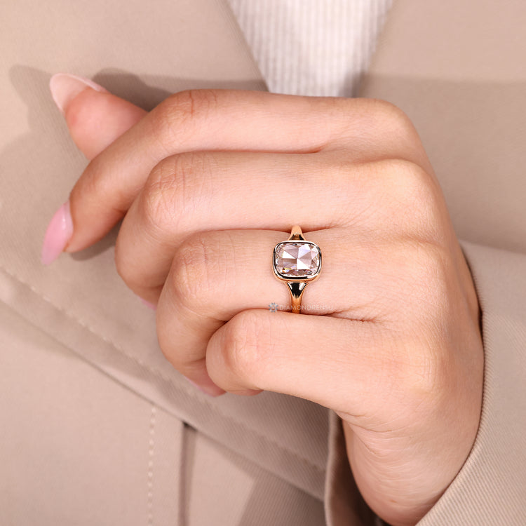 Handmade lab grown diamond ring with bezel setting.