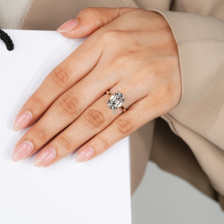 Handmade solitaire ring with four claw prong setting.