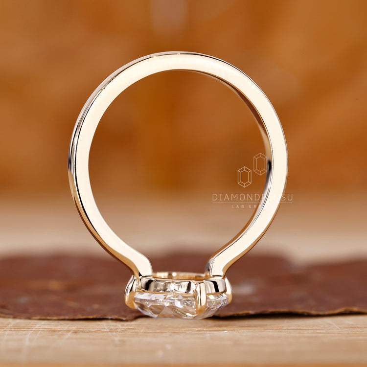 Oval rose cut ring with clean open gallery design.