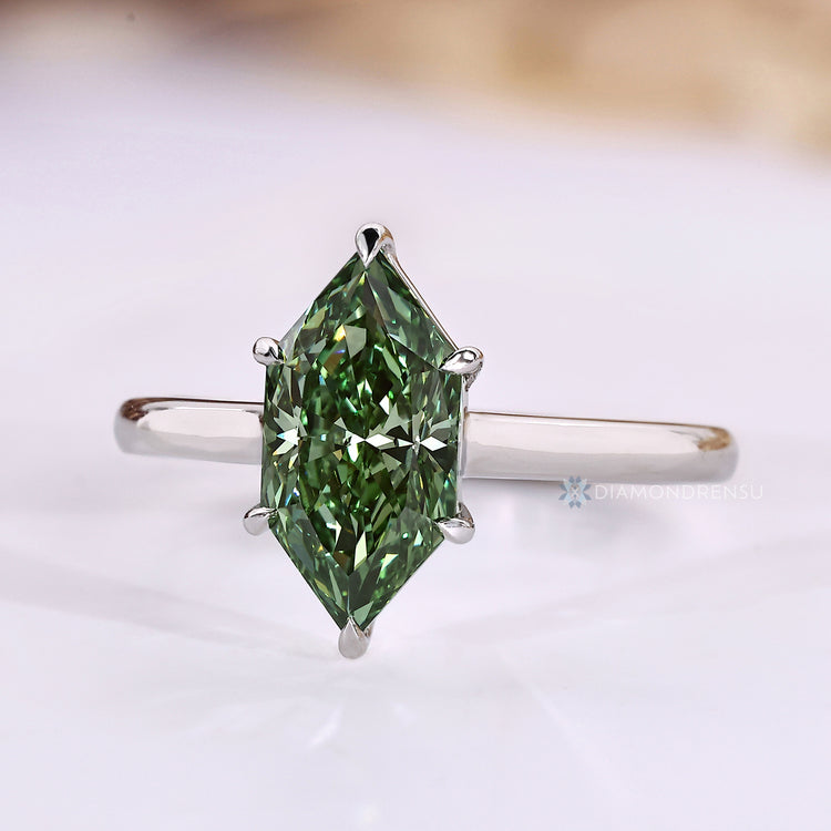 IGI certified Dutch marquise ring with green diamond.