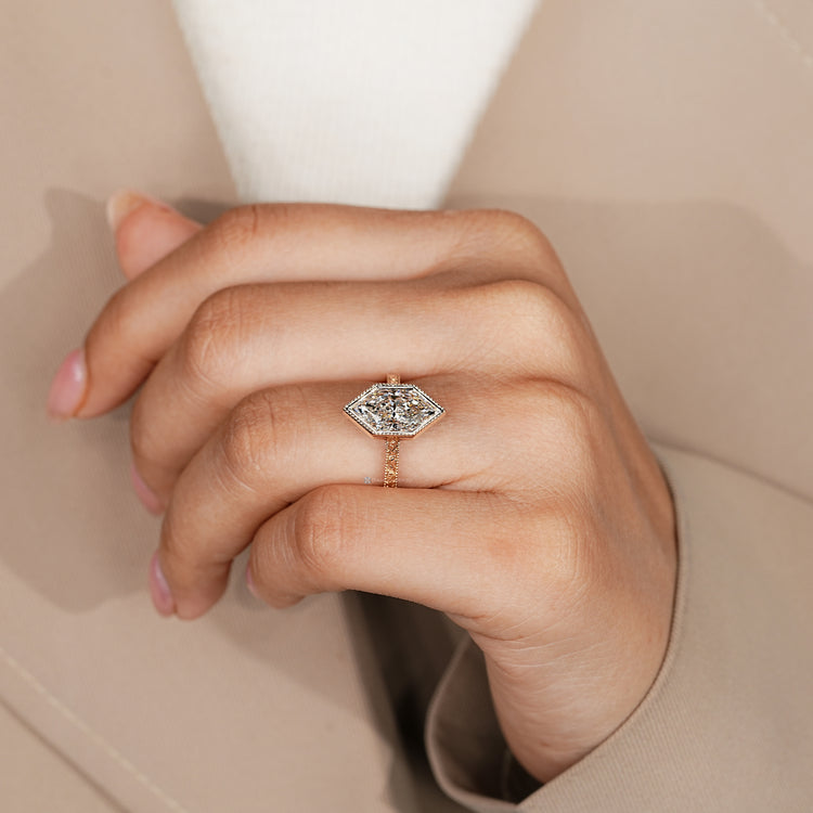 Dutch marquise cut ring with vintage milgrain details.