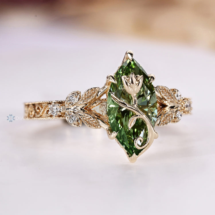 Enchanted Woodland tulip ring with green centre diamond.