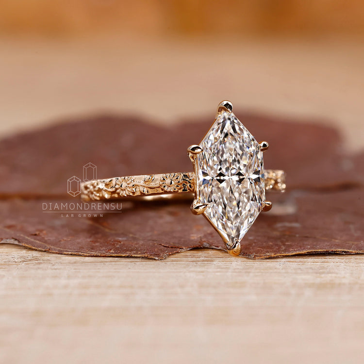 Lab grown dutch marquise diamond ring with sunflower detail.