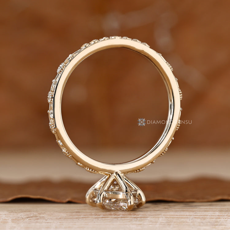 Lab grown marquise diamond ring with floral leaf shank.