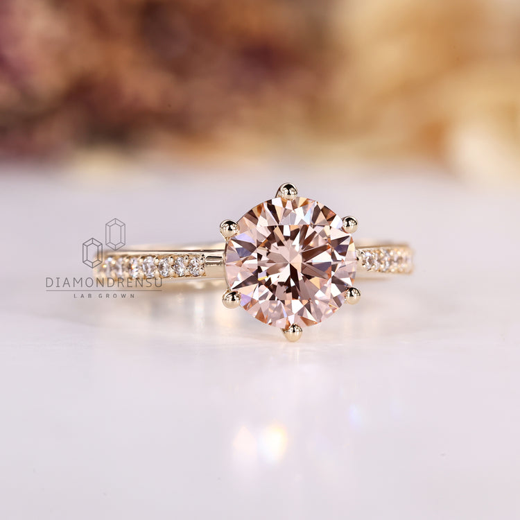 Lab grown diamond ring with six prong setting.