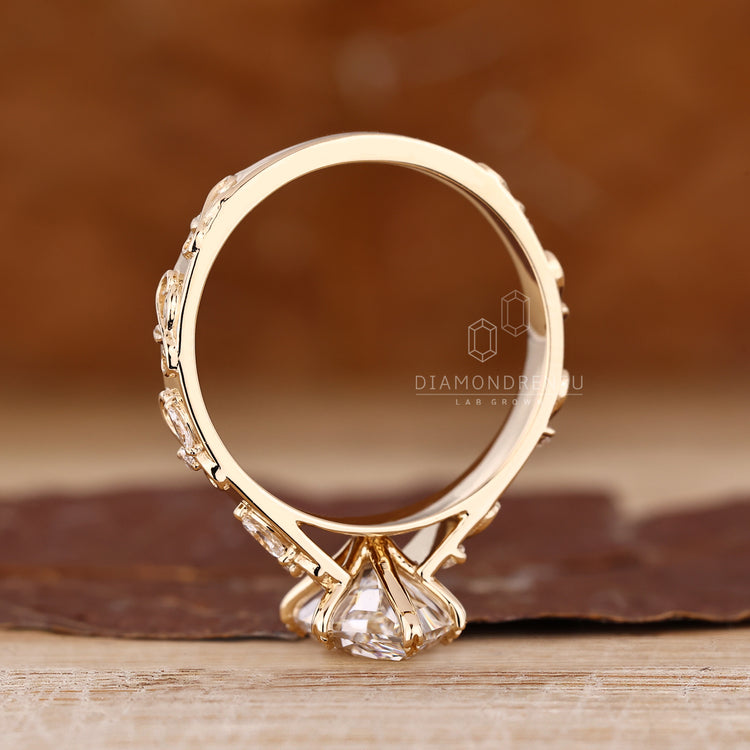 IGI certified marquise diamond ring with side stone accents.