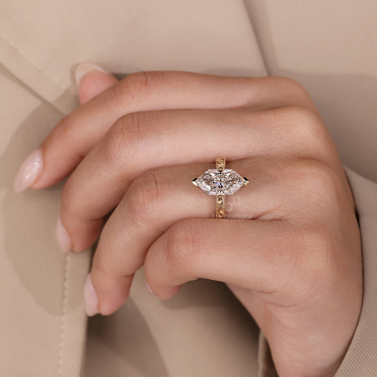 Lab grown marquise diamond ring in art deco style setting.