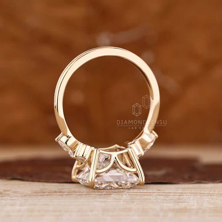 Marquise side stone ring with seven stone layout.