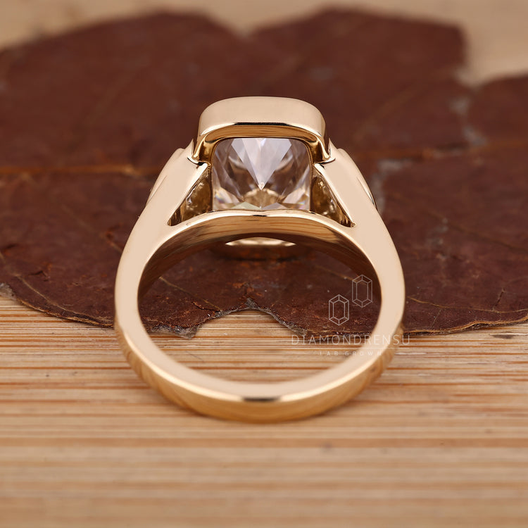 Handmade diamond ring with cathedral and side stones.